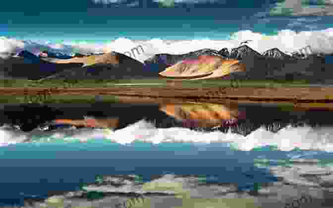 A Panoramic View Of The Tibetan Landscape, With Mountains, Lakes, And Grasslands Motorbike Travels: Tibet Niall Harbison