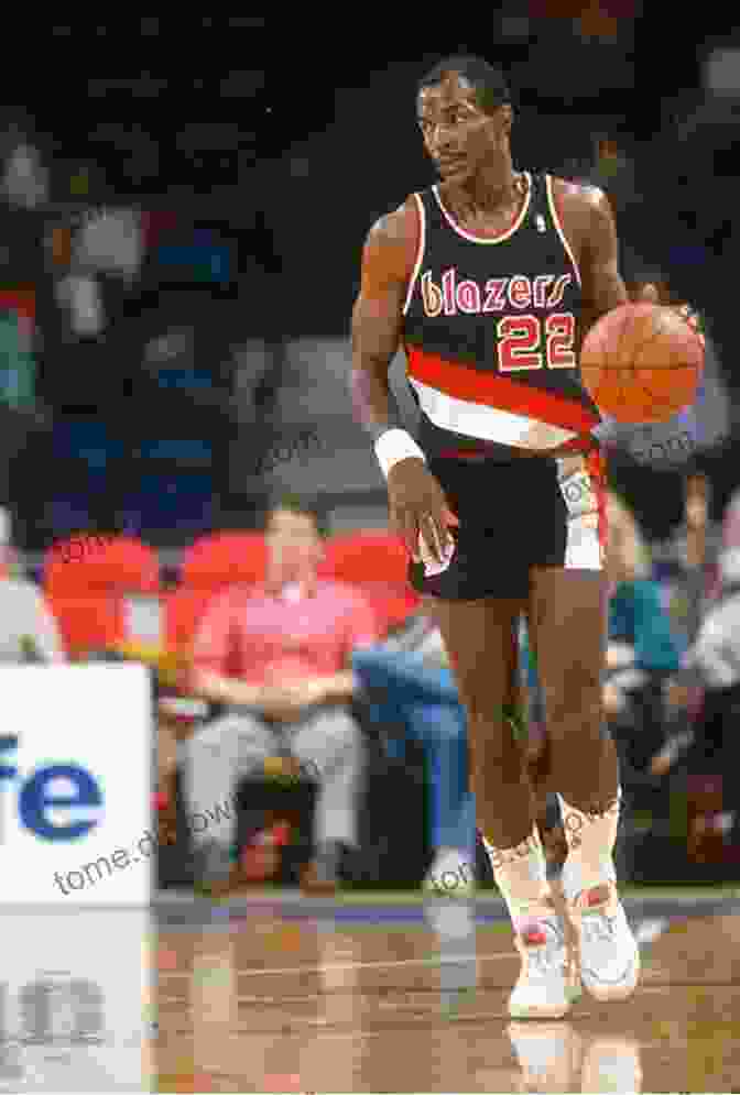 Clyde Drexler Dunking In A Portland Trail Blazers Uniform Clyde Drexler: Clyde Drexler Biography Career Stats And Other Interesting Information: Information About Clyde Drexler