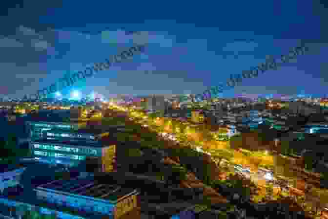 The Vibrant Cityscape Of Dakar At Night, Showcasing Its Blend Of Modern Architecture And Traditional Markets. Traveling To Senegal : Be Prepared Have Fun