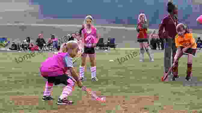 Youth Field Hockey Coach Providing Guidance To Player Youth Field Hockey Drills Strategies Plays Games Handbook (Drills And Plays 10)